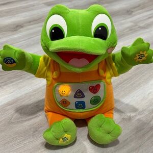 LeapFrog Hug & Learn Baby Tad Plush Interactive Learning Toy Green Education